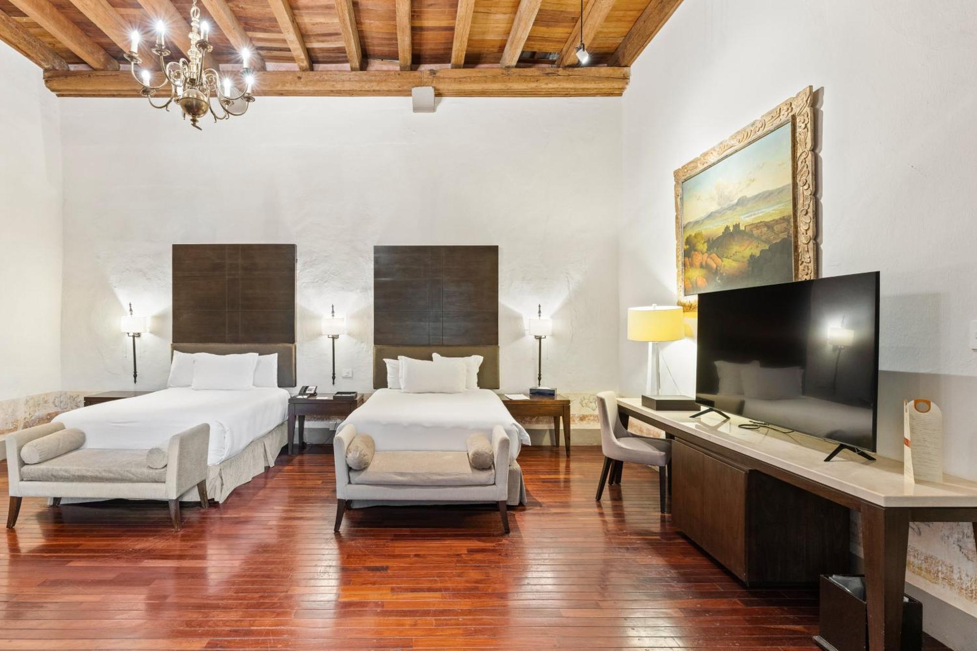 Hotel Quinta Real Puebla Exteriér fotografie A room at Hotel Casa 900